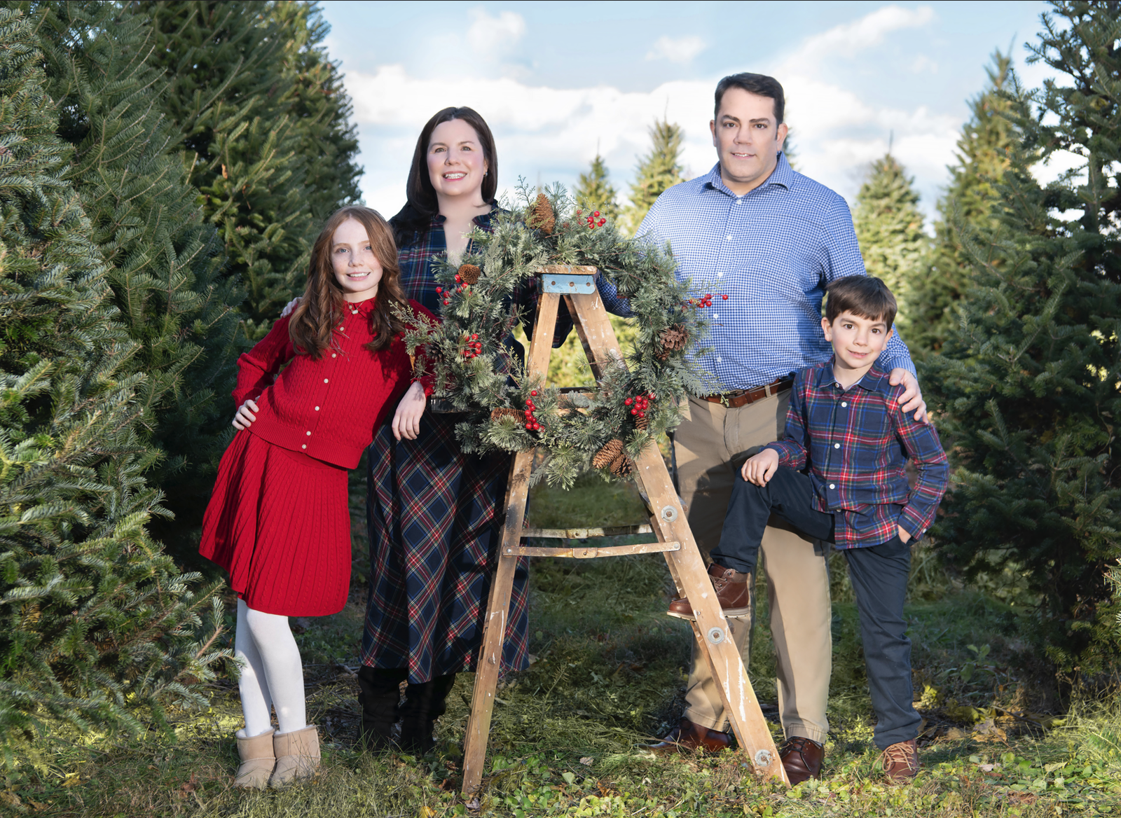 family-christmas-photography-germantown-maryland-pine-trees.jpg